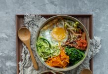 만성피로, 일상 속 작은 변화로 극복한다 brown wooden ladle and white ceramic bowl with soup